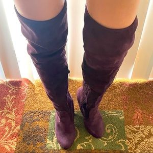 Thigh high burgundy/maroon boots. Size 7.